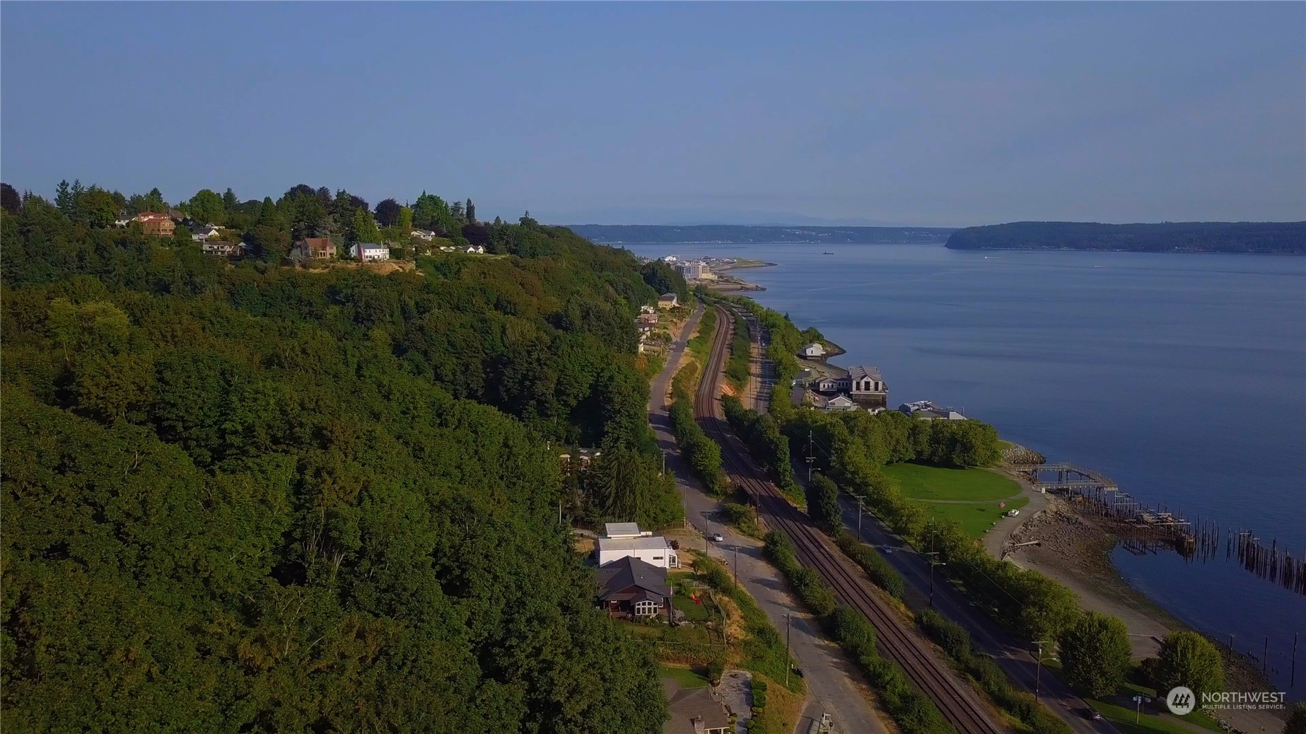 3901 North Adams Street Tacoma, WA 98407 - Photo 5 of 11 a view of a lake with a yard