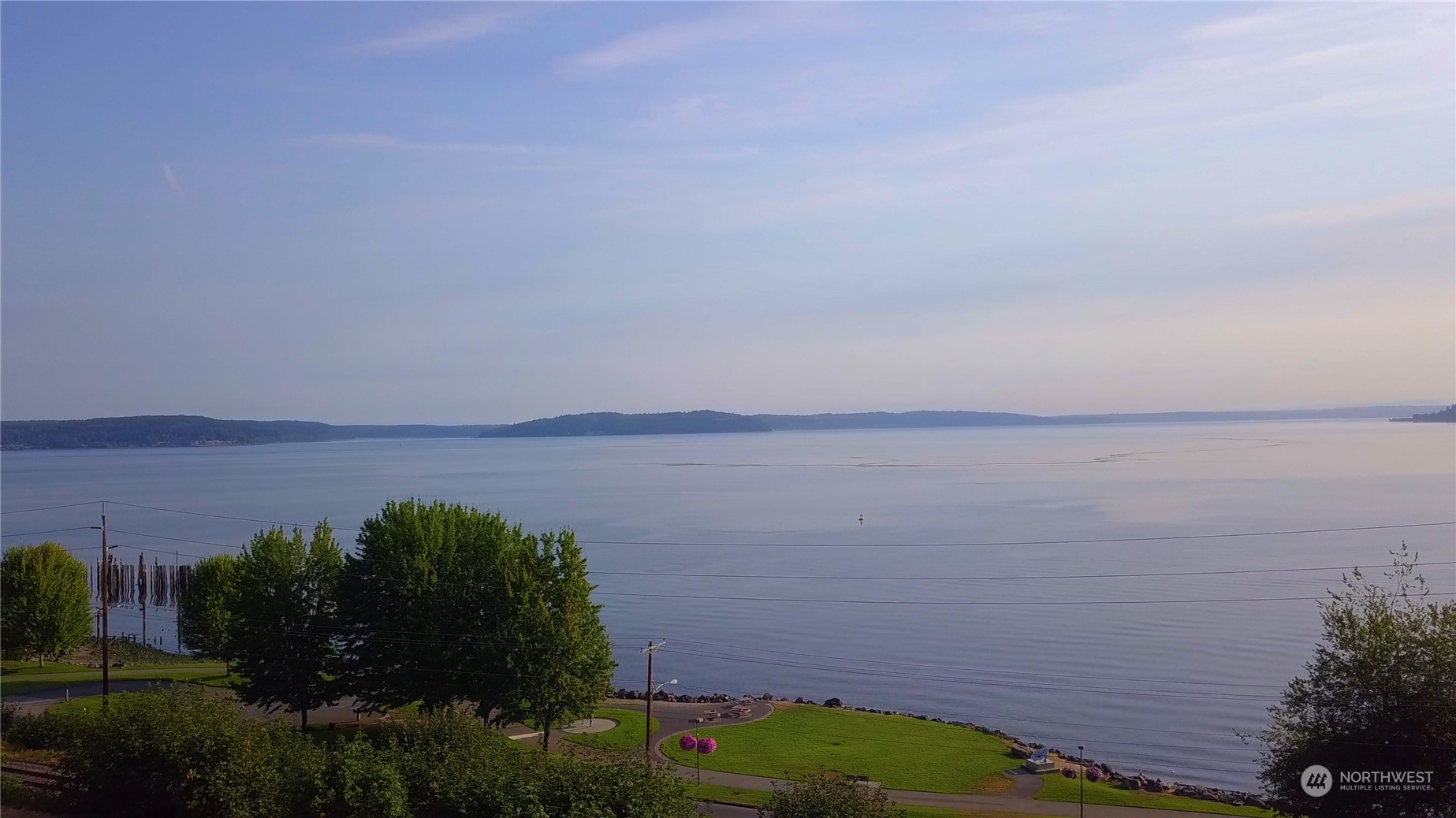 3901 North Adams Street Tacoma, WA 98407 - Photo 6 of 11 a view of lake with green field