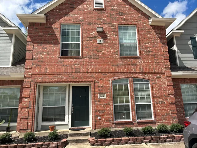 a front view of a brick building