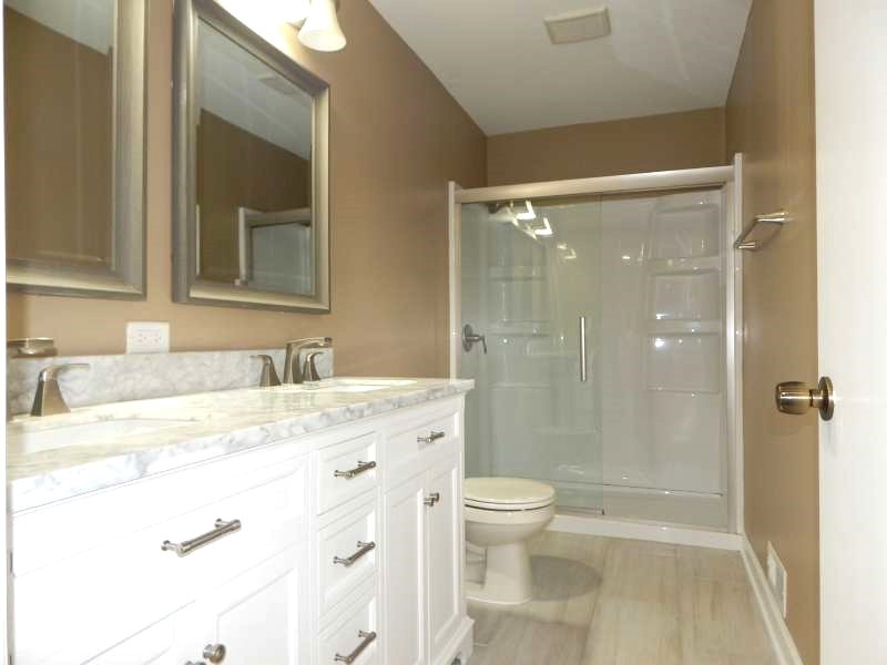 1216 Calico Avenue Naperville, IL 60564 - Photo 9 of 16 a bathroom with a granite countertop sink toilet and shower
