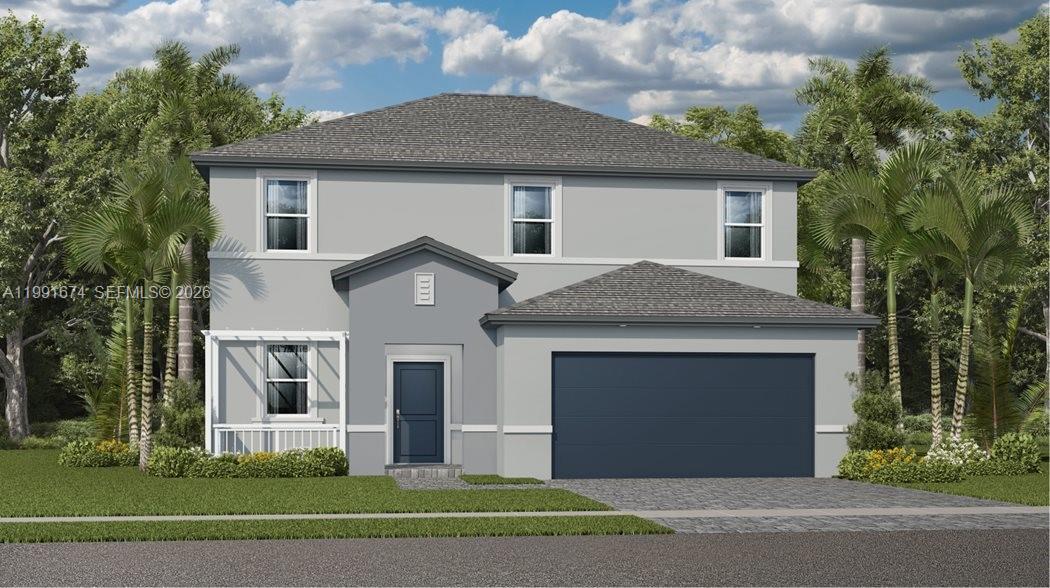 19435 Southwest 337th Terrace Homestead, FL 33034 - Photo 1 of 13 a front view of a house with a garden