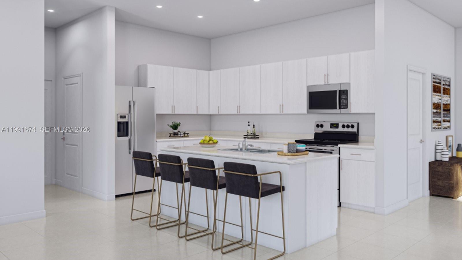 19435 Southwest 337th Terrace Homestead, FL 33034 - Photo 2 of 13 a kitchen with stainless steel appliances kitchen island a refrigerator sink and white cabinets