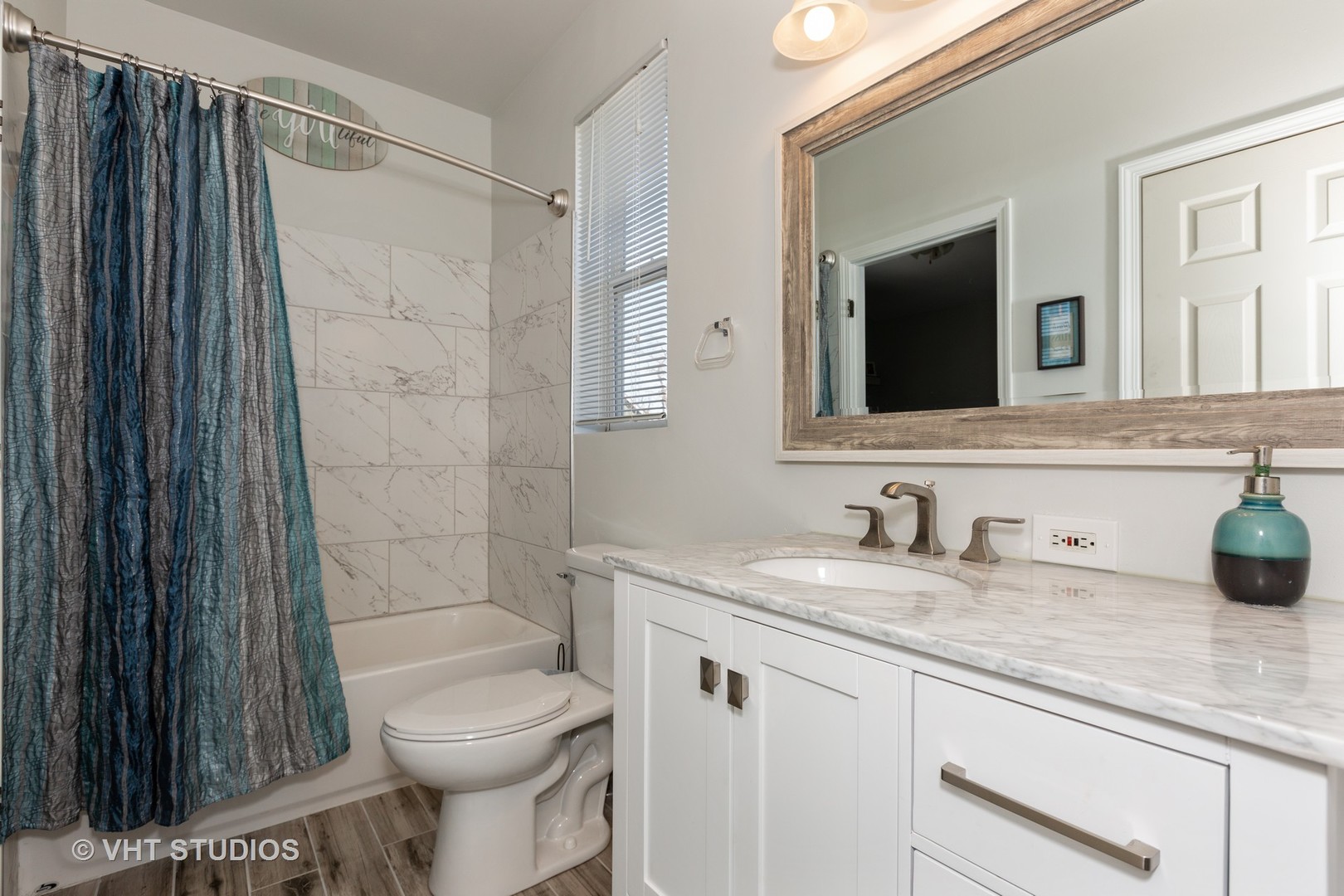 1003 Greenleaf Drive Joliet, IL 60436 - Photo 6 of 10 a bathroom with a granite countertop sink toilet and shower