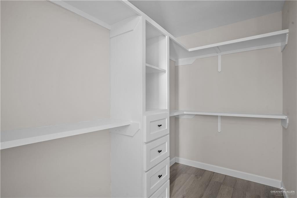 1343 Middle Street Alamo, TX 78516 - Photo 8 of 17 a view of an empty walk in closet