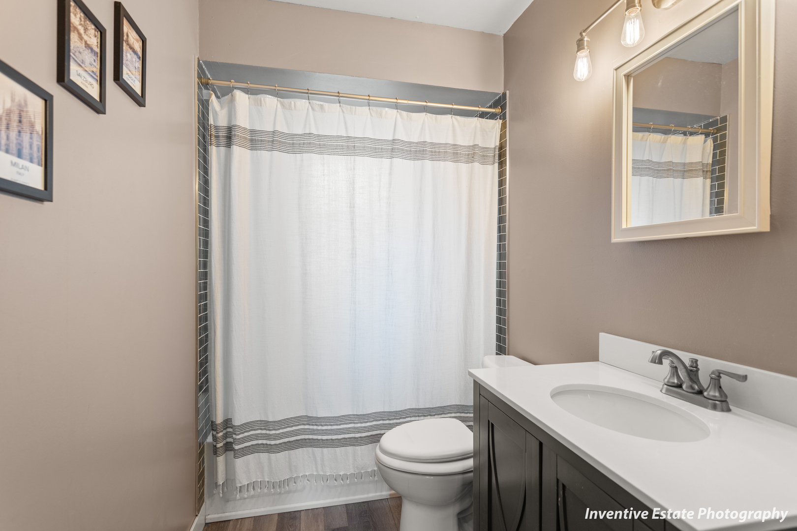359 Galahad Road Bolingbrook, IL 60440 - Photo 15 of 22 a bathroom with a sink toilet and shower