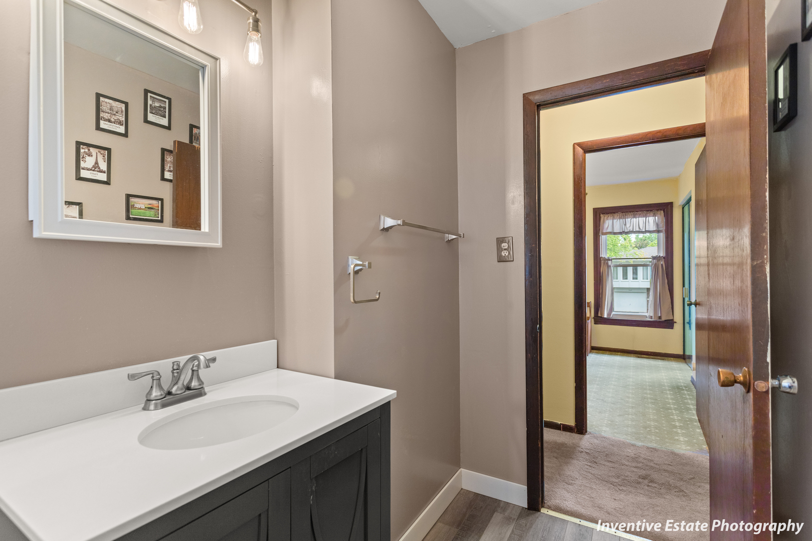 359 Galahad Road Bolingbrook, IL 60440 - Photo 16 of 22 a bathroom with a sink vanity and a mirror
