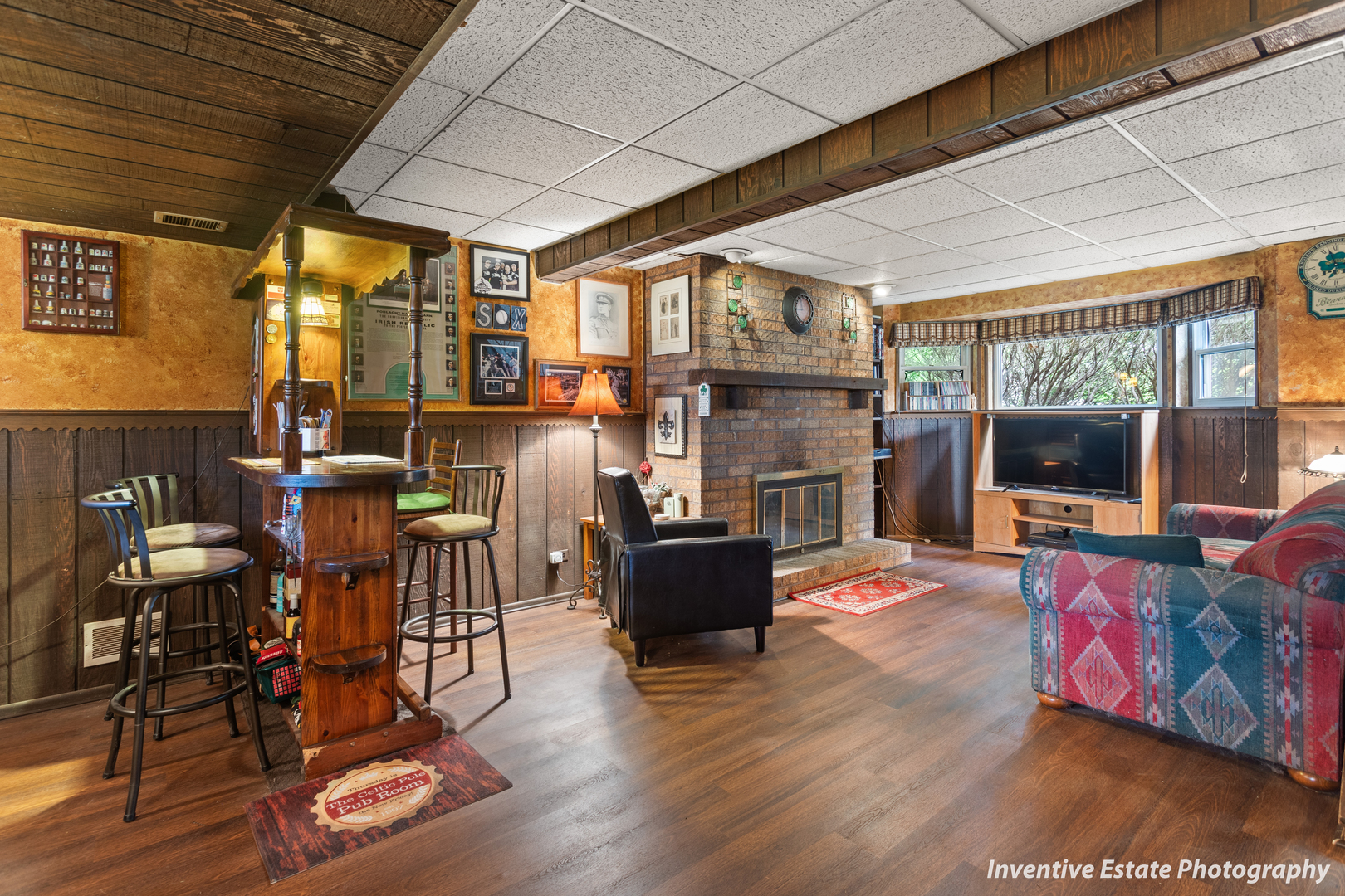 359 Galahad Road Bolingbrook, IL 60440 - Photo 18 of 22 a living room with furniture and a flat screen tv