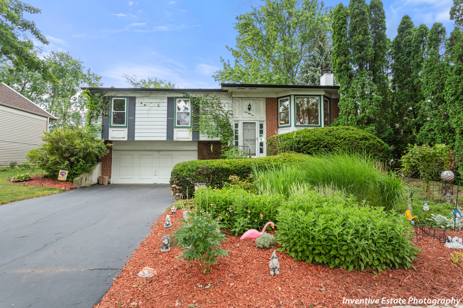 359 Galahad Road Bolingbrook, IL 60440 - Photo 2 of 22 front view of a house with a yard