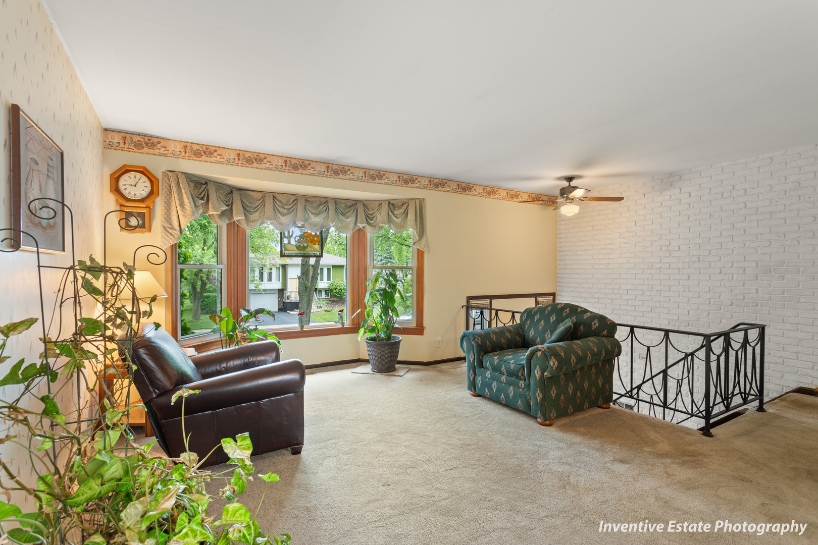 359 Galahad Road Bolingbrook, IL 60440 - Photo 4 of 22 a living room with furniture and a flat screen tv