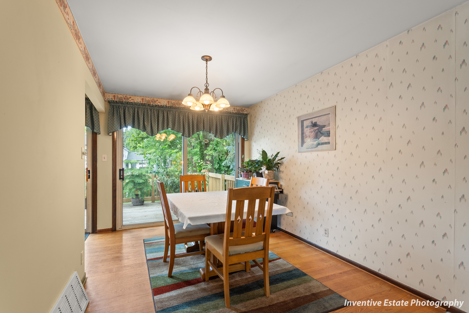 359 Galahad Road Bolingbrook, IL 60440 - Photo 6 of 22 a view of a dining room with furniture window and wooden floor