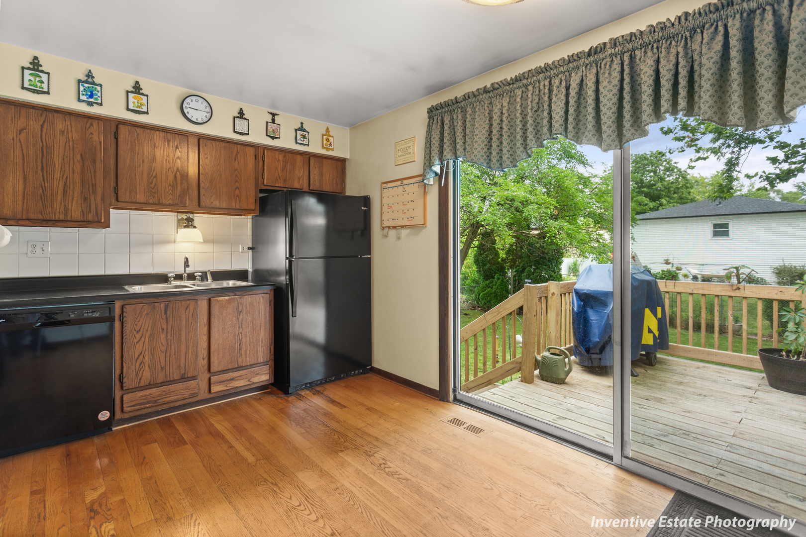 359 Galahad Road Bolingbrook, IL 60440 - Photo 9 of 22 a kitchen with stainless steel appliances granite countertop a refrigerator and a stove top oven