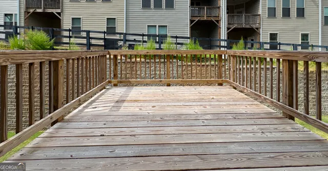 a view of deck with a chair