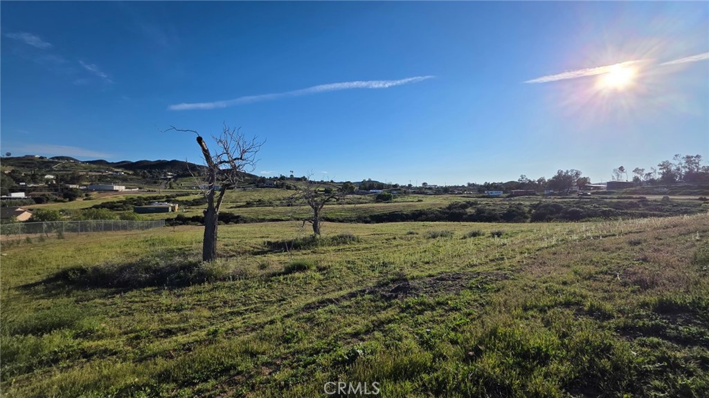 25350 Waldon Road Menifee, CA 92584 - Photo 4 of 12 a view of a lake from a yard