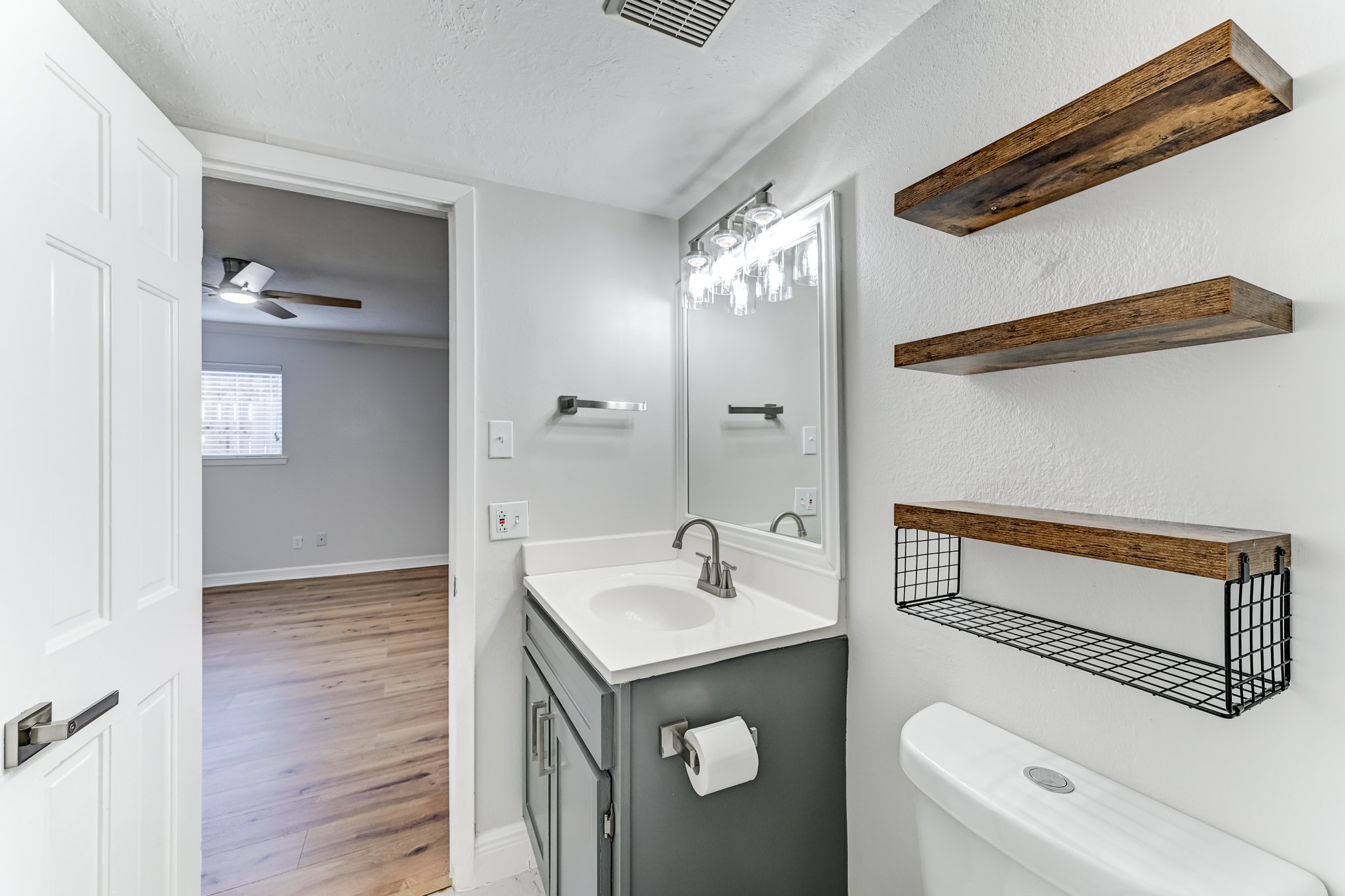 3224 Timmons Lane, Unit 157 Houston, TX 77027 - Photo 25 of 30 a bathroom with a sink a toilet and shower