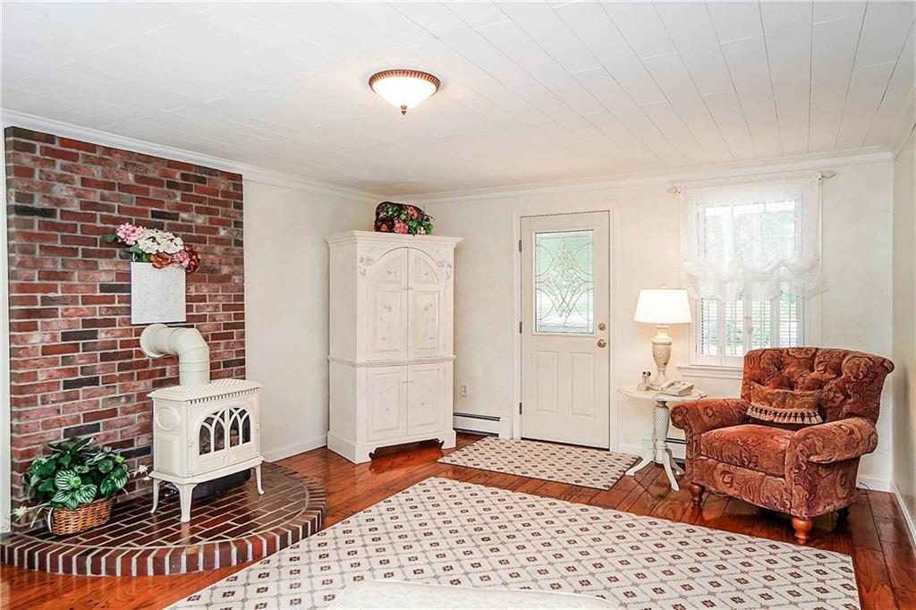 255 Methodist Road Westbrook, ME 04092 - Photo 16 of 34 Sitting room includes outdoor access.