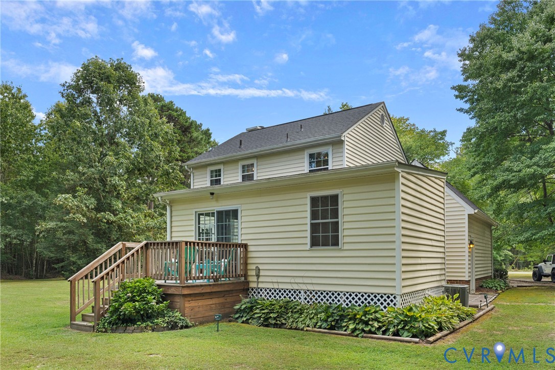5010 Tatum Road Disputanta, VA 23842 - Photo 40 of 50 Exterior featuring horizontal siding, a wooden dec