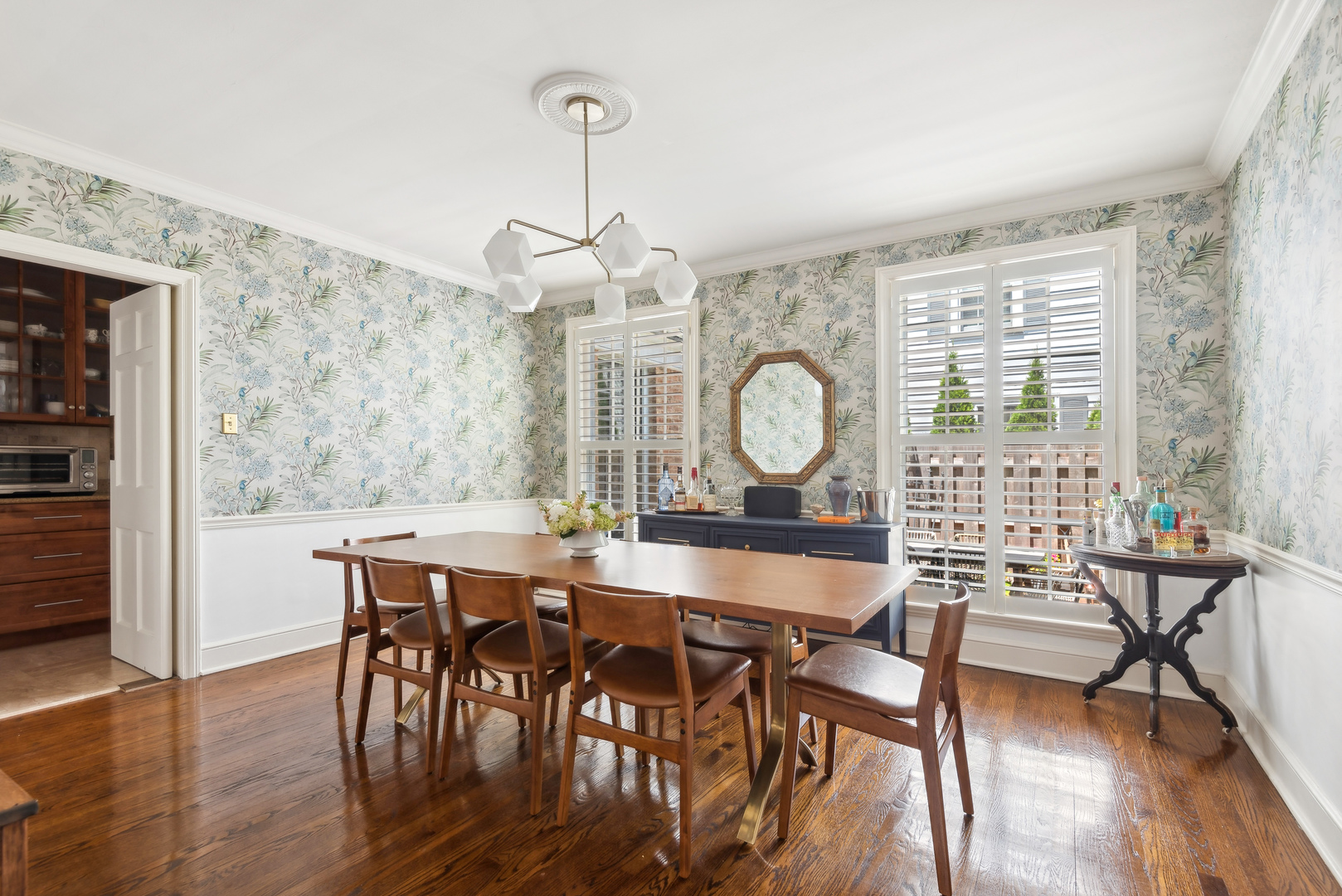 1249 Ridge Road Wilmette, IL 60091 - Photo 11 of 43 a view of a dining room with furniture window and wooden floor