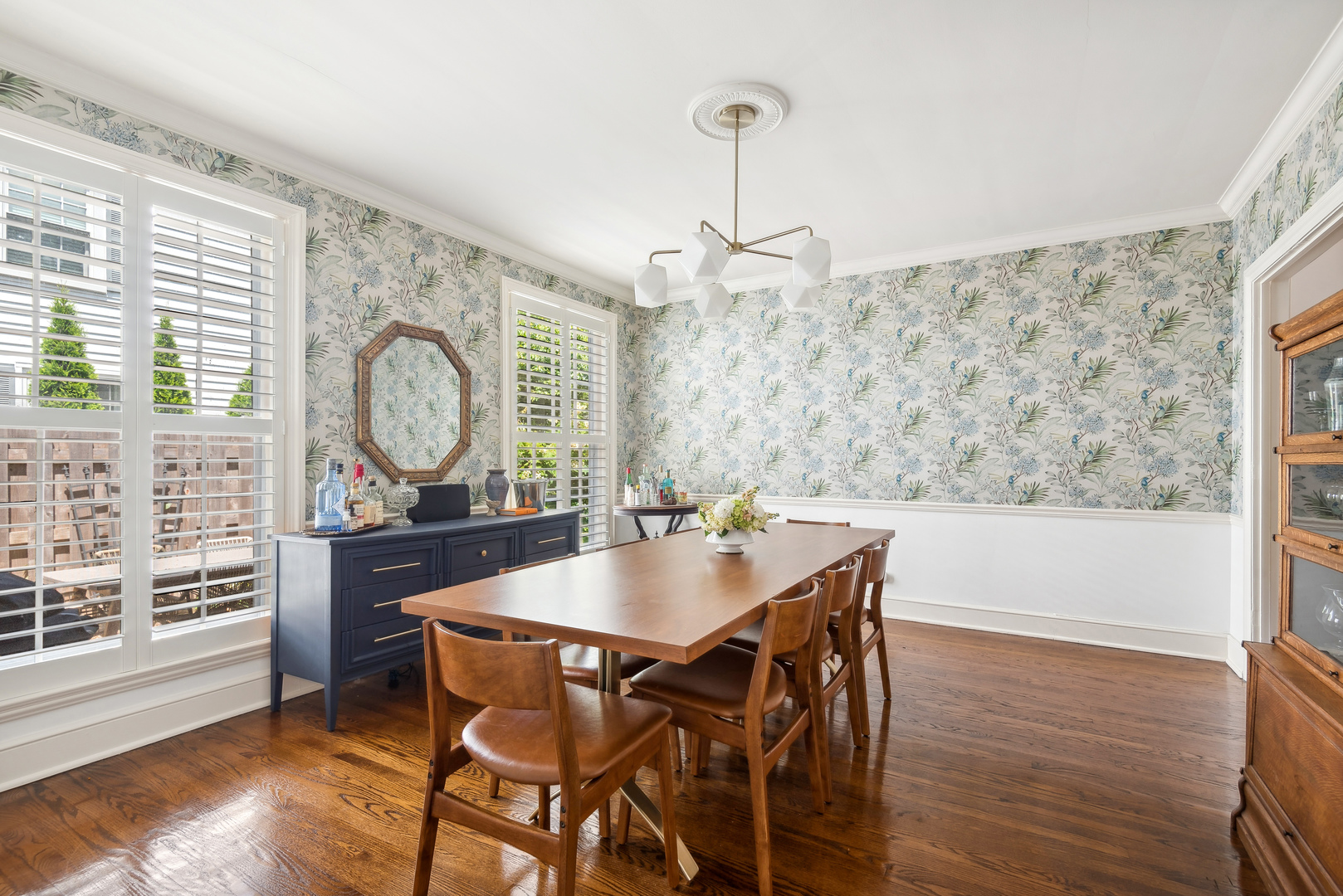 1249 Ridge Road Wilmette, IL 60091 - Photo 13 of 43 a view of a dining room with furniture window and wooden floor