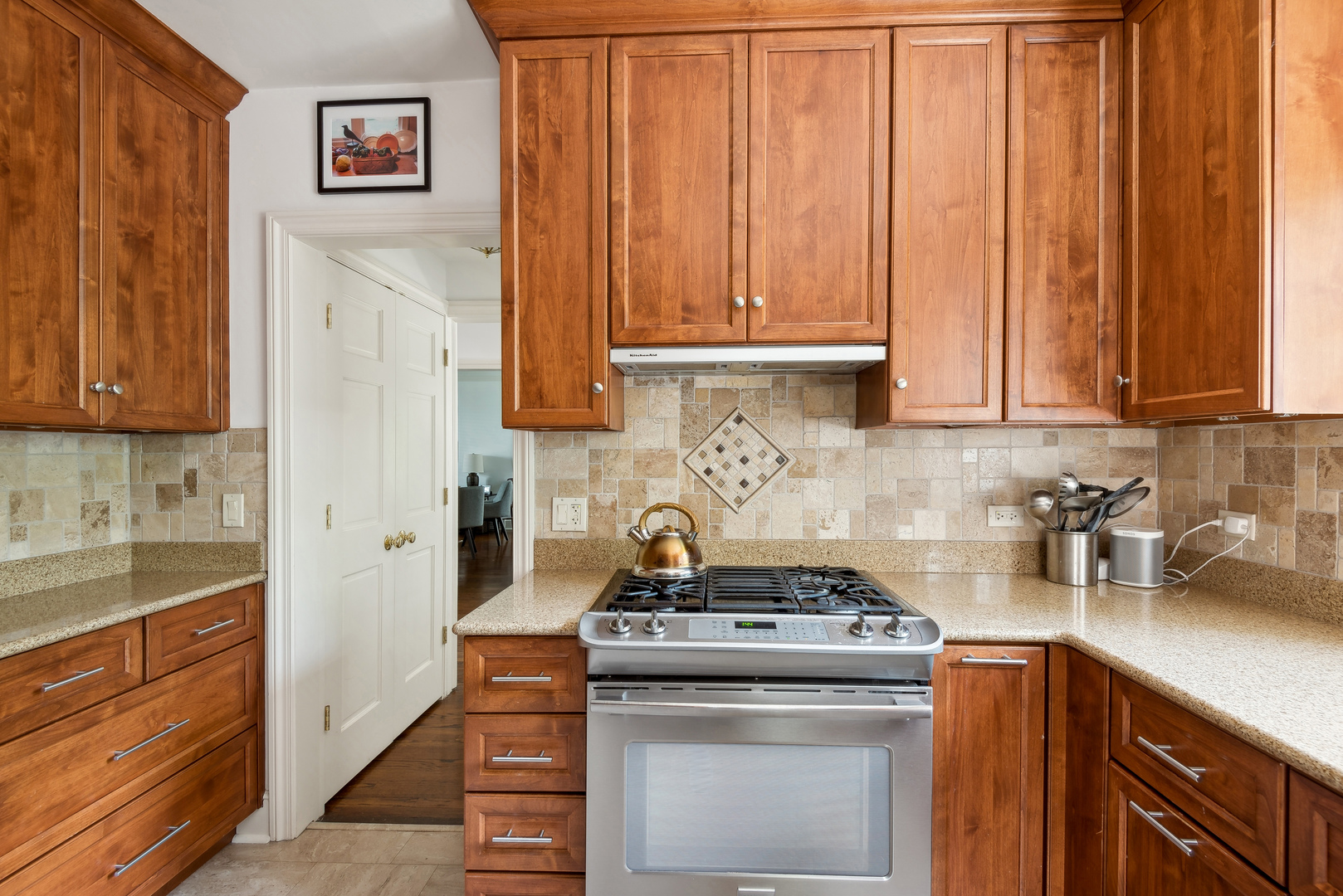 1249 Ridge Road Wilmette, IL 60091 - Photo 16 of 43 a kitchen with a stove and cabinets