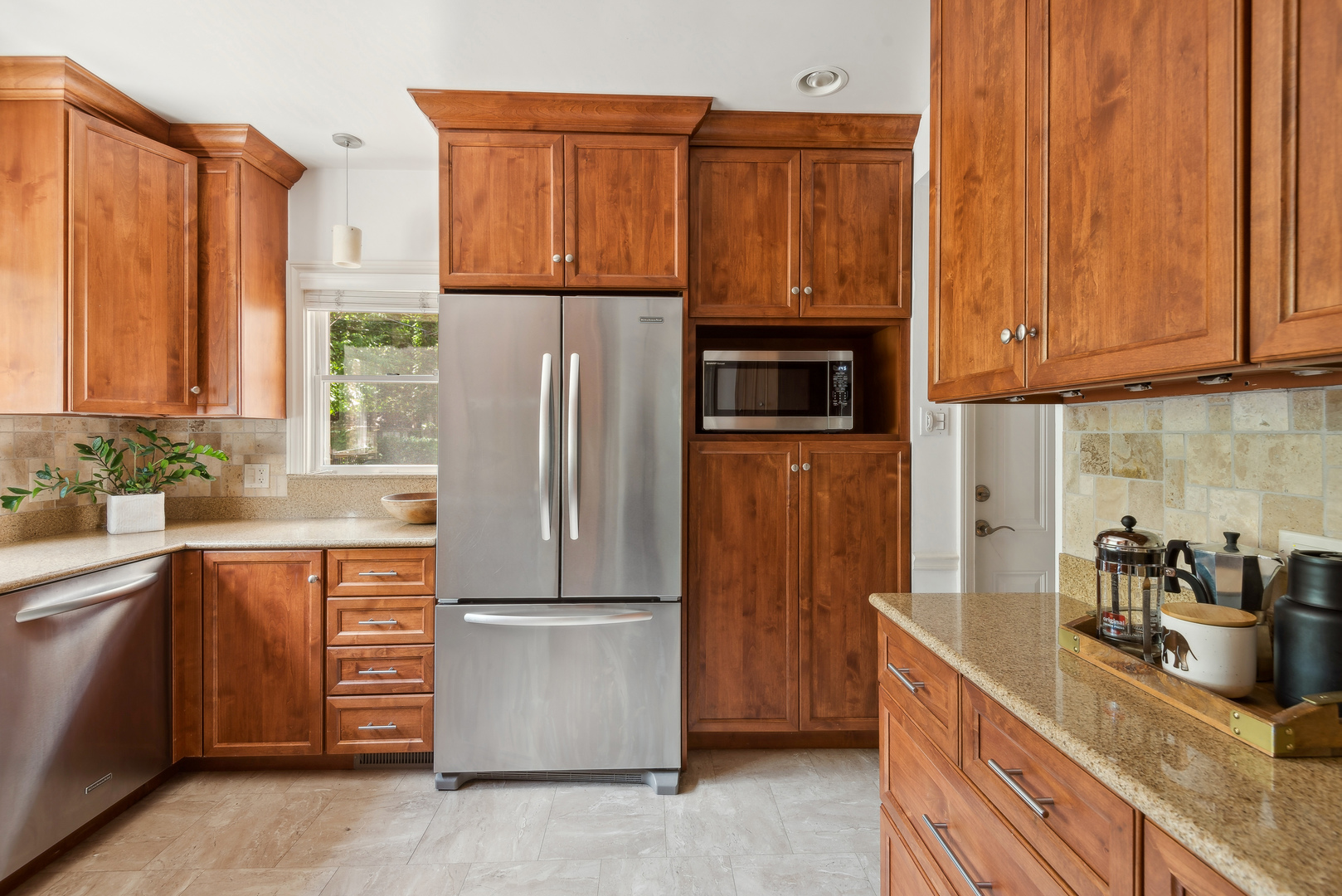 1249 Ridge Road Wilmette, IL 60091 - Photo 17 of 43 a kitchen with appliances a sink and cabinets