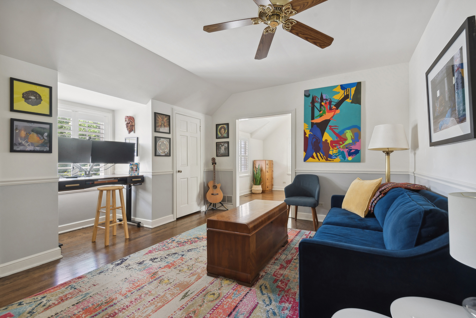 1249 Ridge Road Wilmette, IL 60091 - Photo 23 of 43 a living room with furniture and a flat screen tv