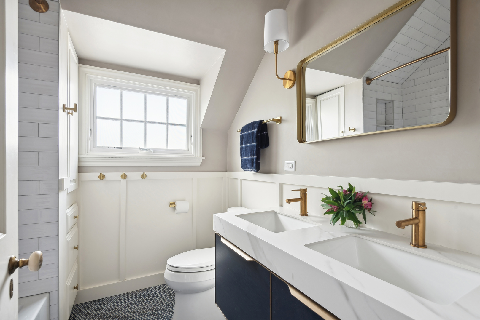 1249 Ridge Road Wilmette, IL 60091 - Photo 32 of 43 a bathroom with a sink a toilet and mirror