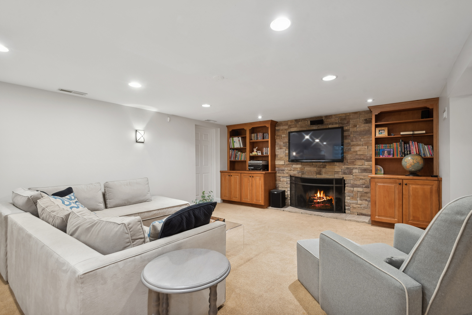 1249 Ridge Road Wilmette, IL 60091 - Photo 34 of 43 a living room with furniture and a fireplace