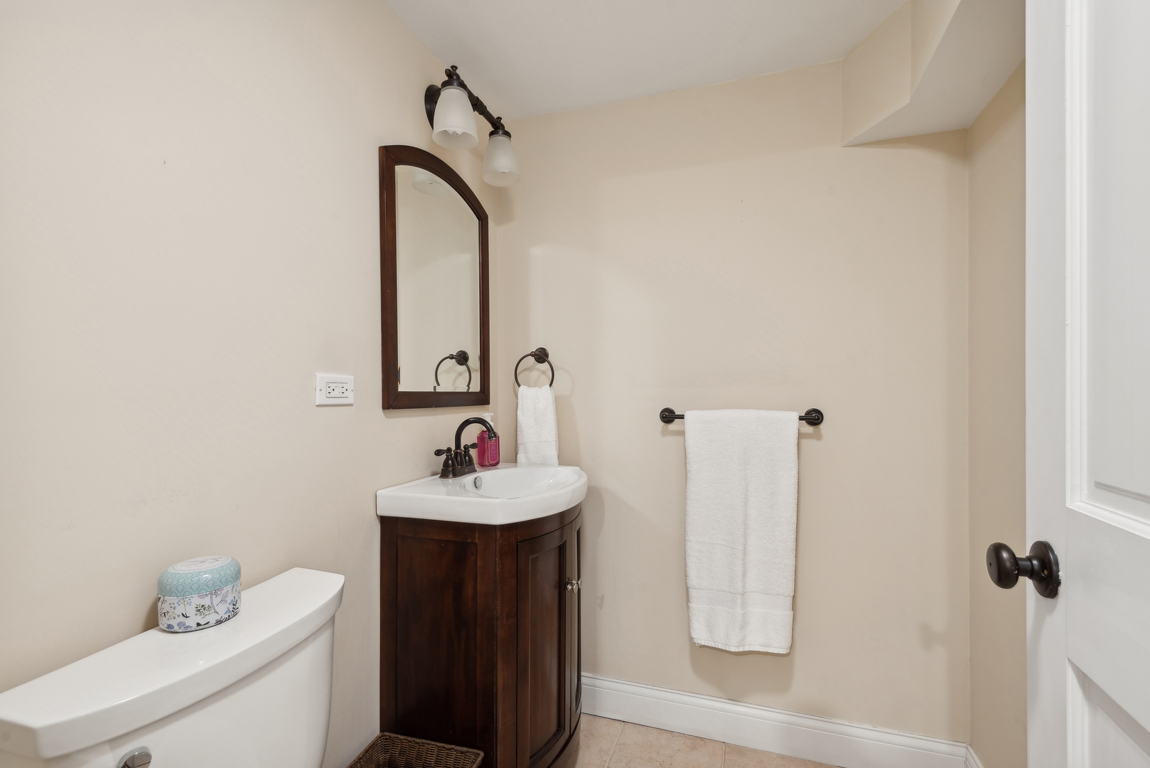 1249 Ridge Road Wilmette, IL 60091 - Photo 37 of 43 a bathroom with a sink and a mirror