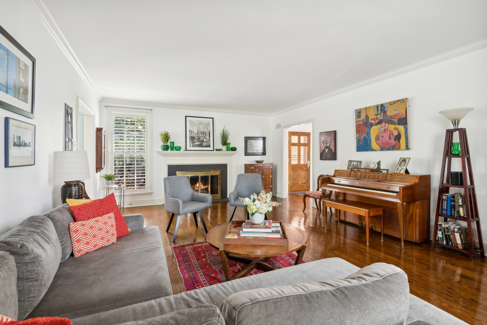 1249 Ridge Road Wilmette, IL 60091 - Photo 6 of 43 a living room with furniture fireplace and a large window