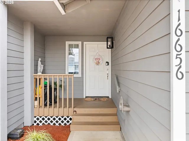 a kitchen with a table and chairs
