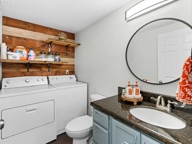 a bed room with a bed and a window