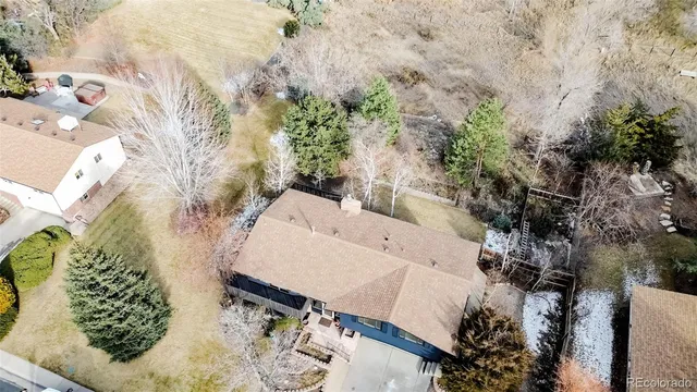 an aerial view of a houses with outdoor space