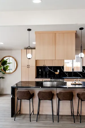 a kitchen with a table and a stove