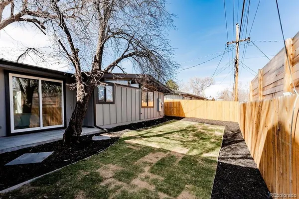 a view of a backyard of the house