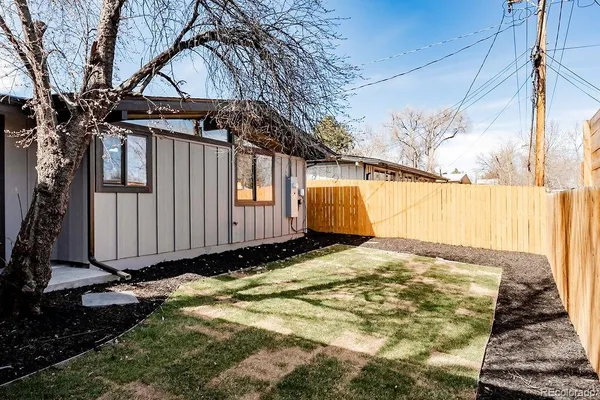 a view of a backyard of the house
