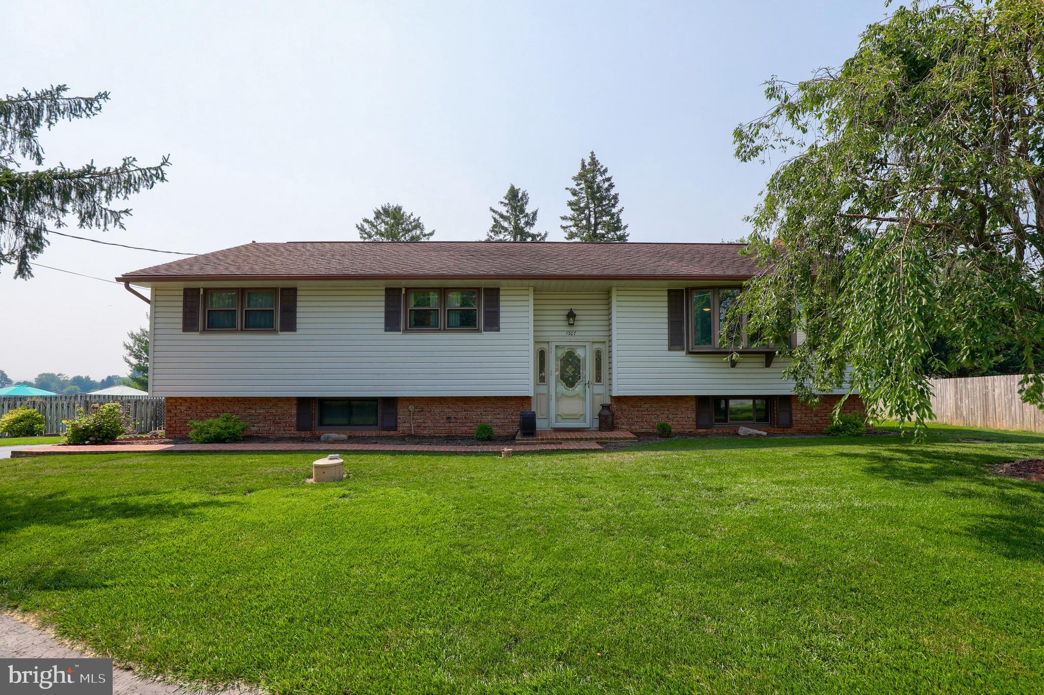 1307 Lookout Lane Lititz, PA 17543 - Photo 1 of 58 a view of a house with a backyard