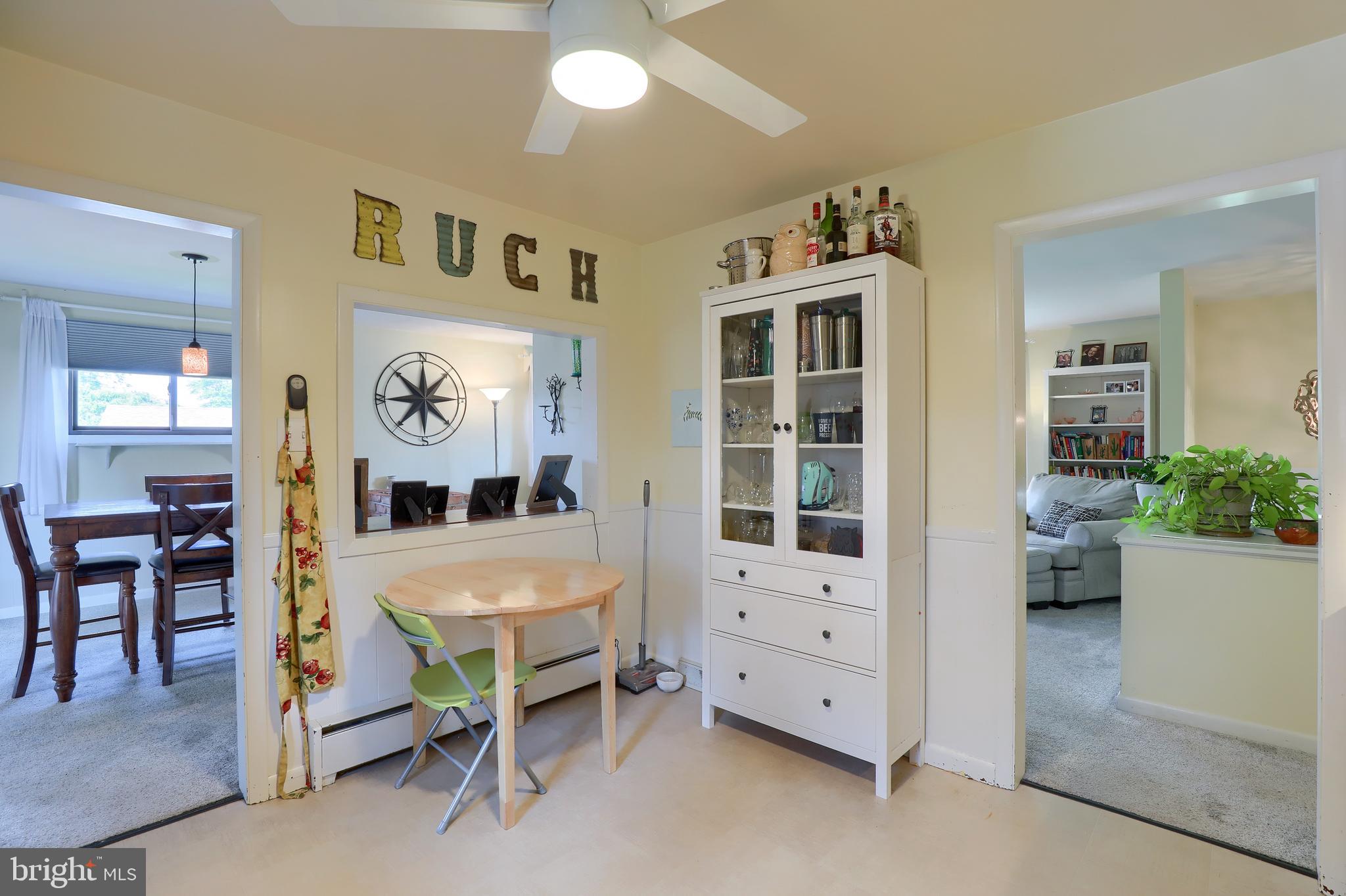 1307 Lookout Lane Lititz, PA 17543 - Photo 12 of 58 a living room with furniture and paintings on the wall
