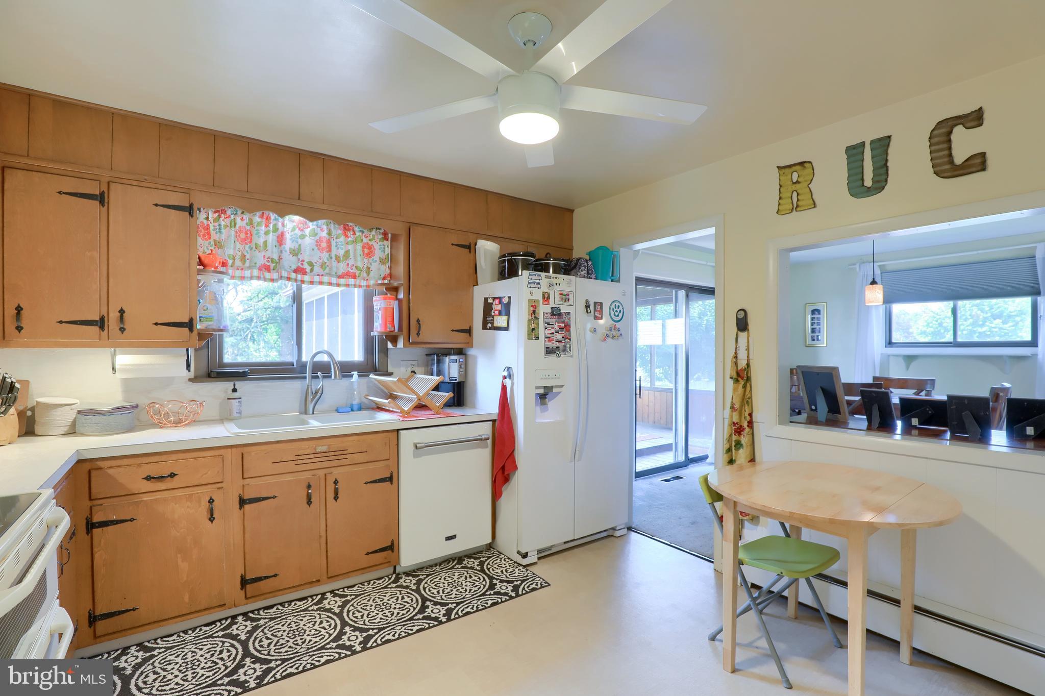 1307 Lookout Lane Lititz, PA 17543 - Photo 13 of 58 a kitchen that has a lot of cabinets a sink and appliances in it