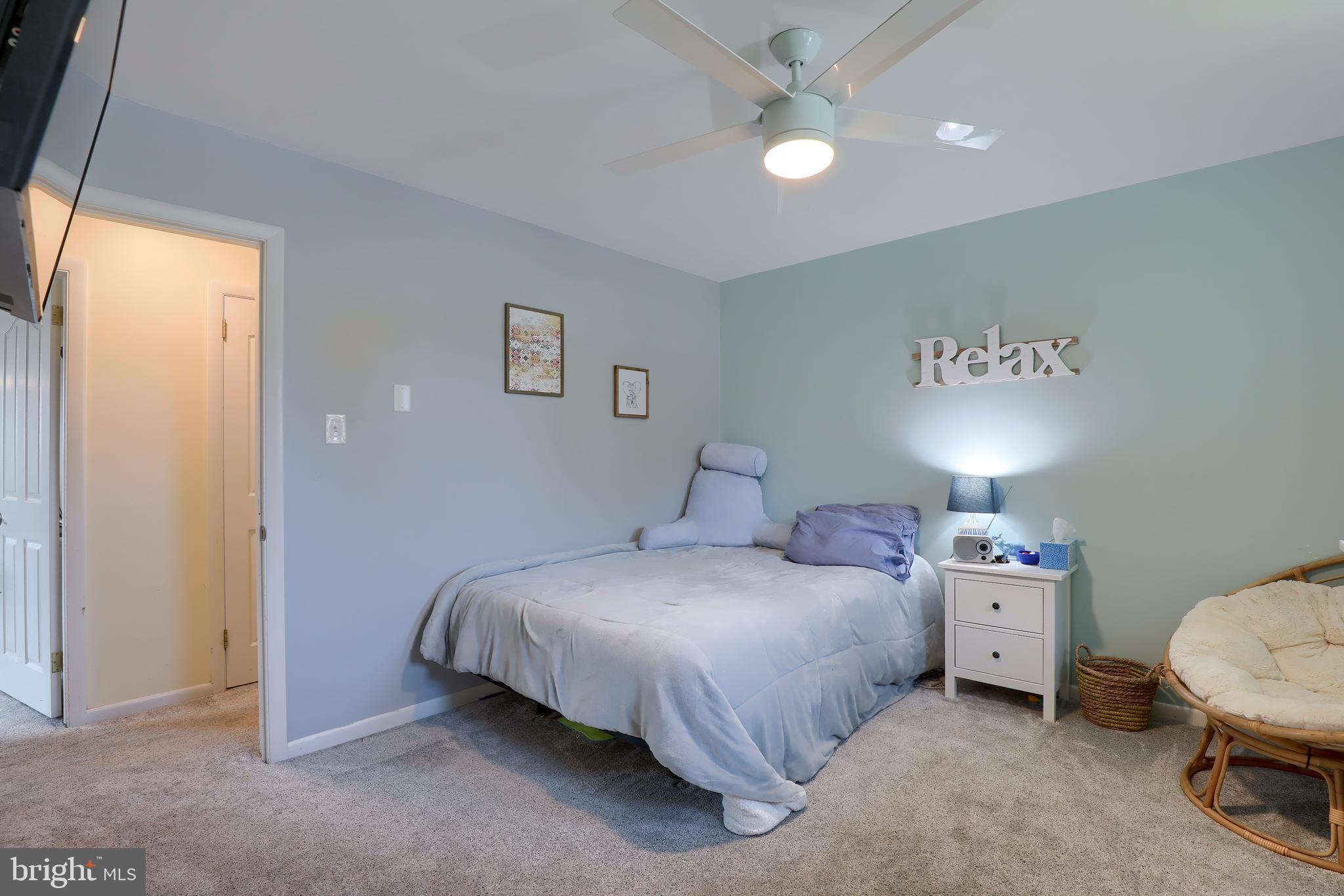 1307 Lookout Lane Lititz, PA 17543 - Photo 17 of 58 a bedroom with a bed and a chandelier