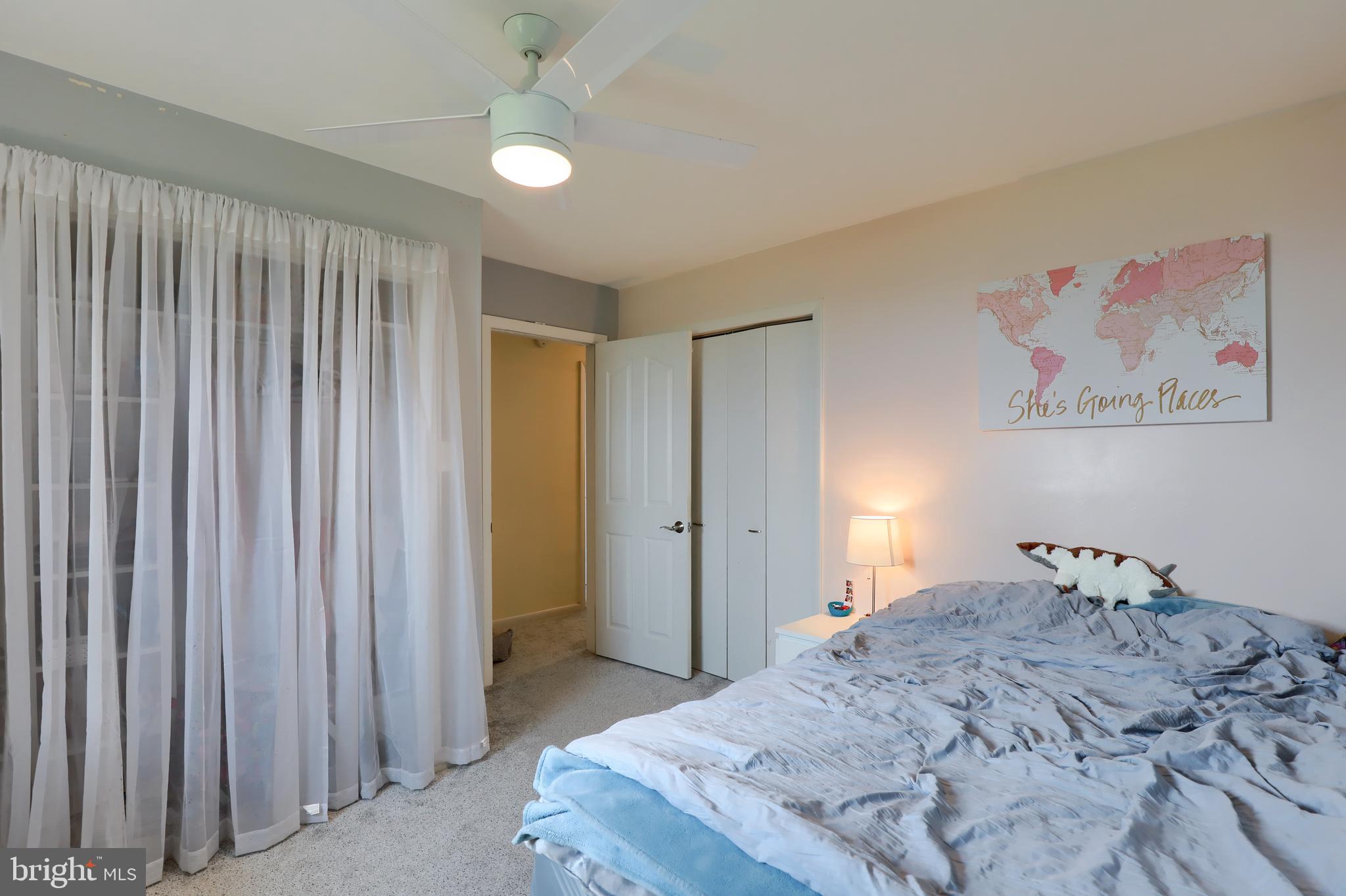 1307 Lookout Lane Lititz, PA 17543 - Photo 20 of 58 a bedroom with a bed and a chandelier