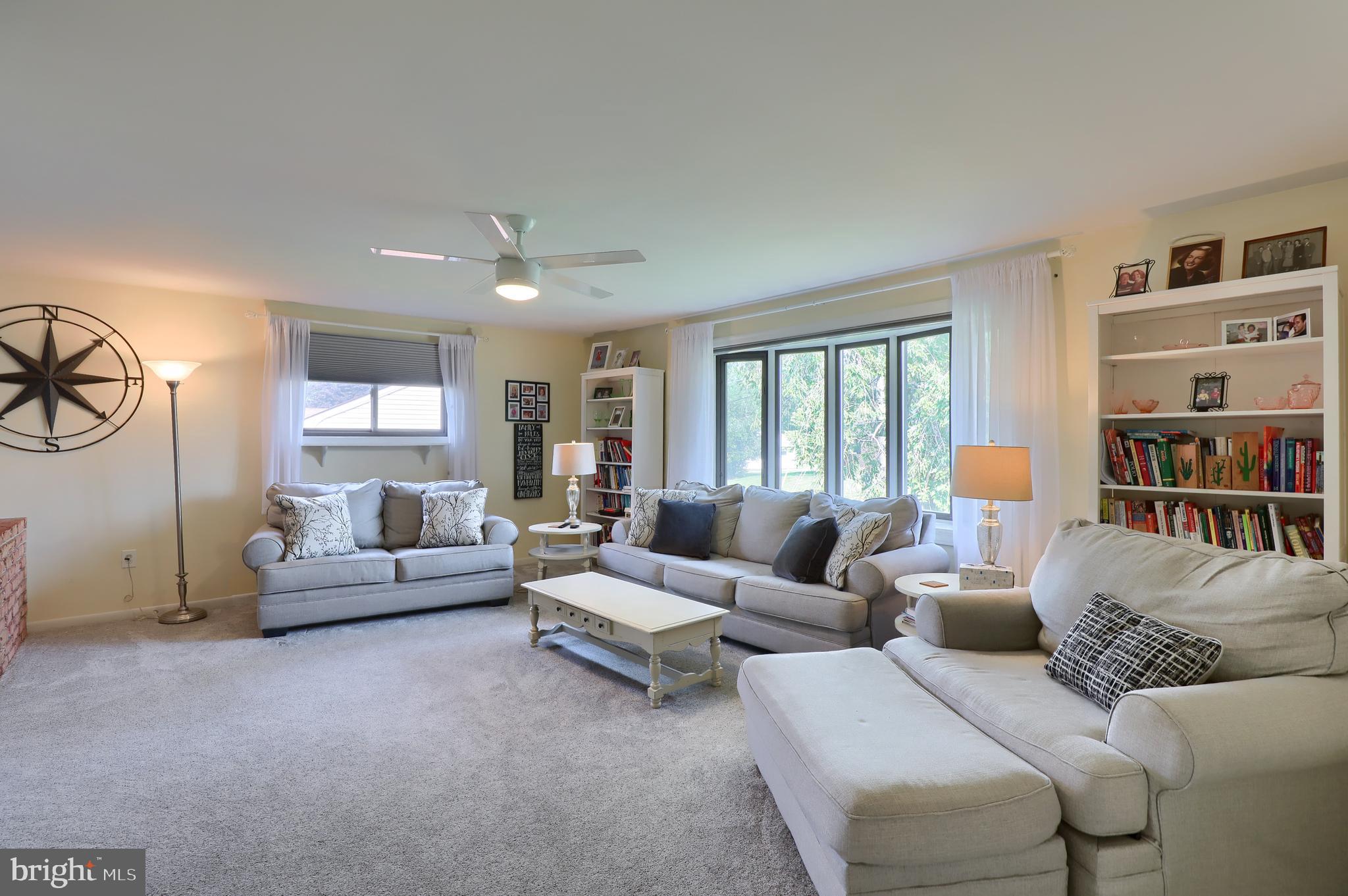 1307 Lookout Lane Lititz, PA 17543 - Photo 3 of 58 a living room with furniture and a book shelf