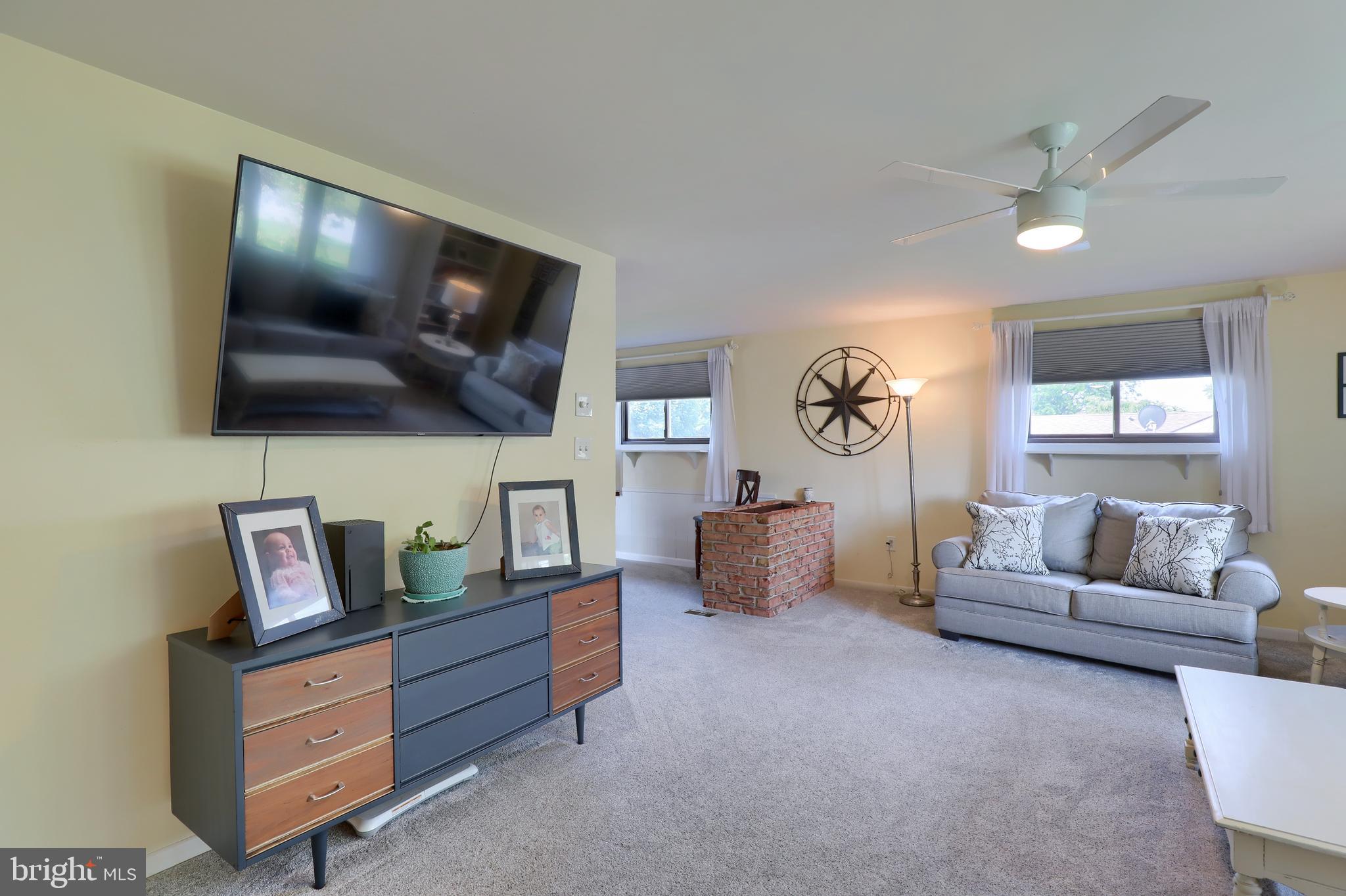 1307 Lookout Lane Lititz, PA 17543 - Photo 4 of 58 a living room with furniture and a flat screen tv