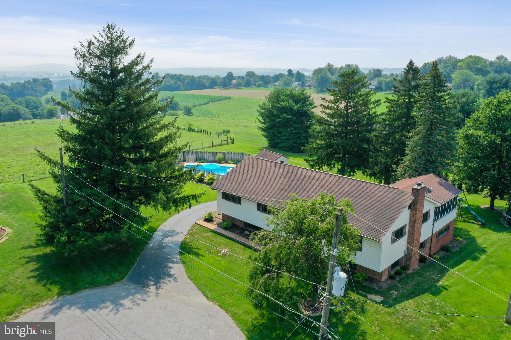 1307 Lookout Lane Lititz, PA 17543 - Photo 44 of 58 an aerial view of a house with a garden
