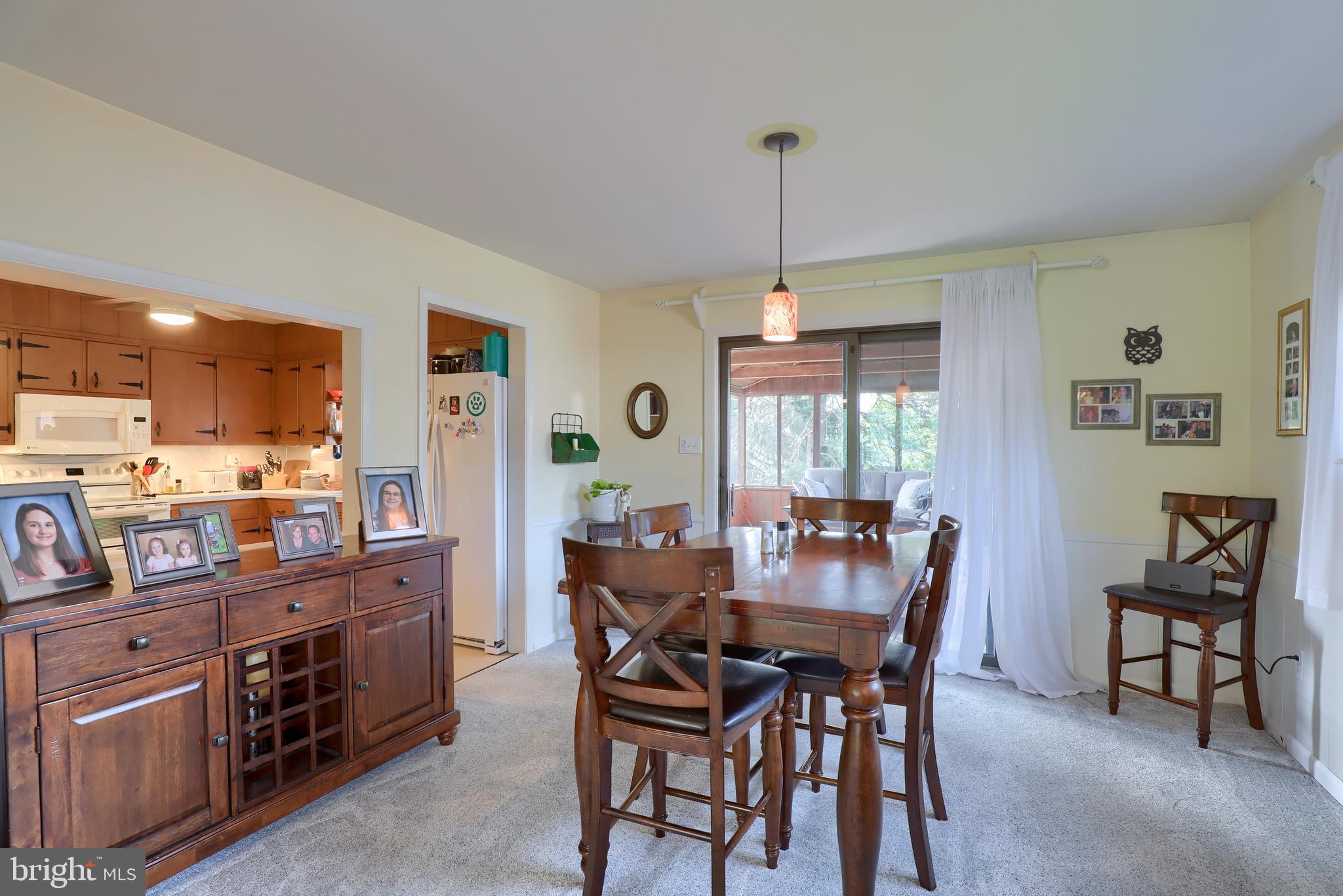 1307 Lookout Lane Lititz, PA 17543 - Photo 7 of 58 a view of a dining room with furniture window and wooden floor