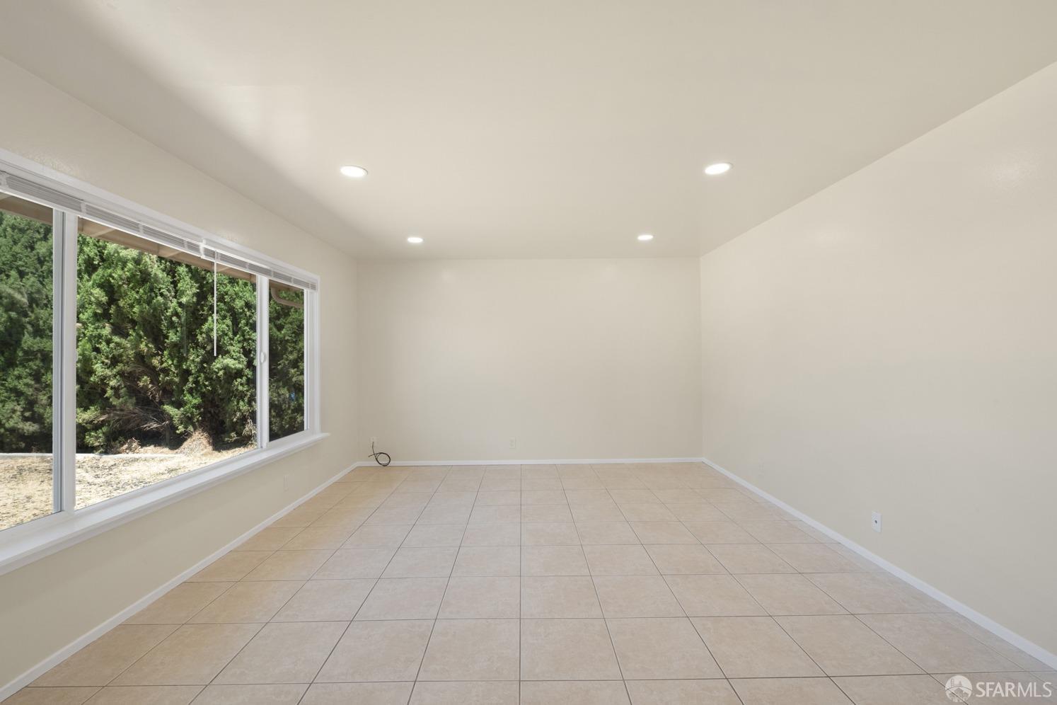 2934 Longview Road Antioch, CA 94509 - Photo 4 of 36 a view of an empty room with a window