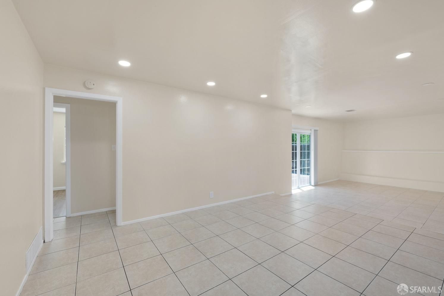 2934 Longview Road Antioch, CA 94509 - Photo 8 of 36 an empty room with white walls and tiles