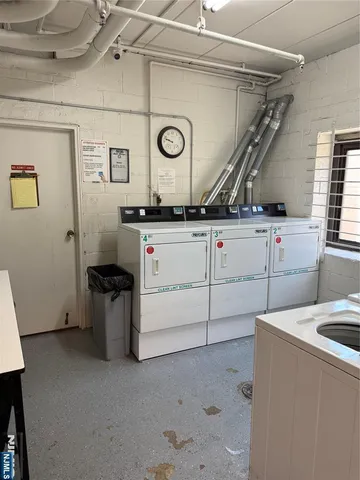 a utility room with cabinets