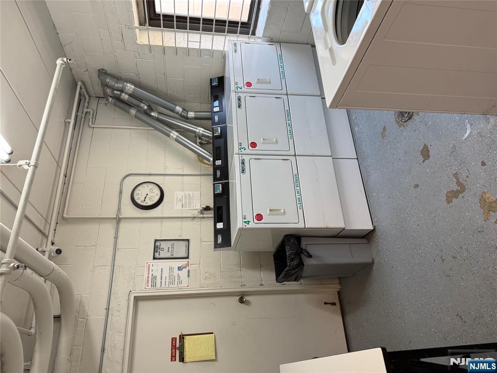 873 Main Street, Unit 2E Hackensack, NJ 07601 - Photo 14 of 14 a utility room with cabinets