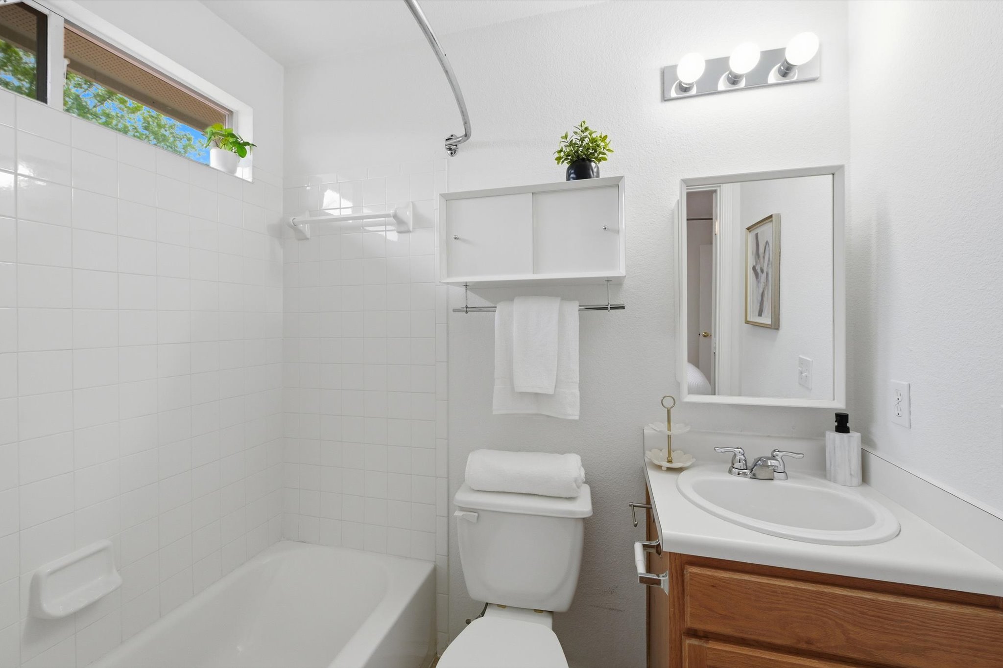 5321 Tower Trail Austin, TX 78723 - Photo 15 of 22 a bathroom with a sink a toilet and shower