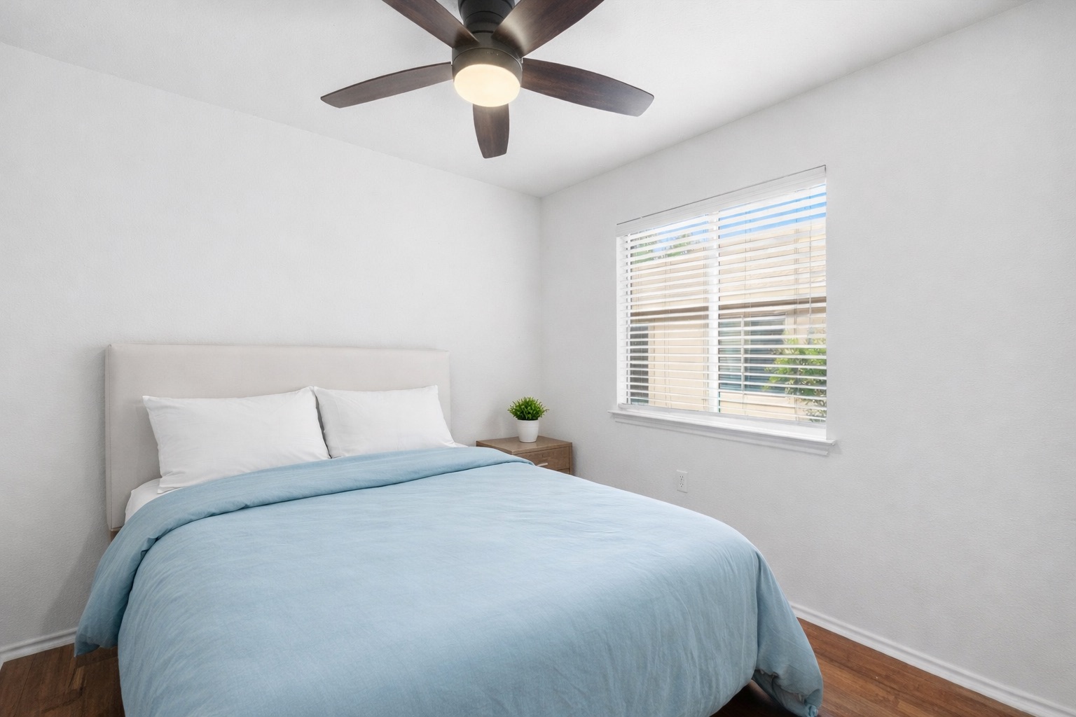 5321 Tower Trail Austin, TX 78723 - Photo 19 of 22 a bedroom with a bed and a window